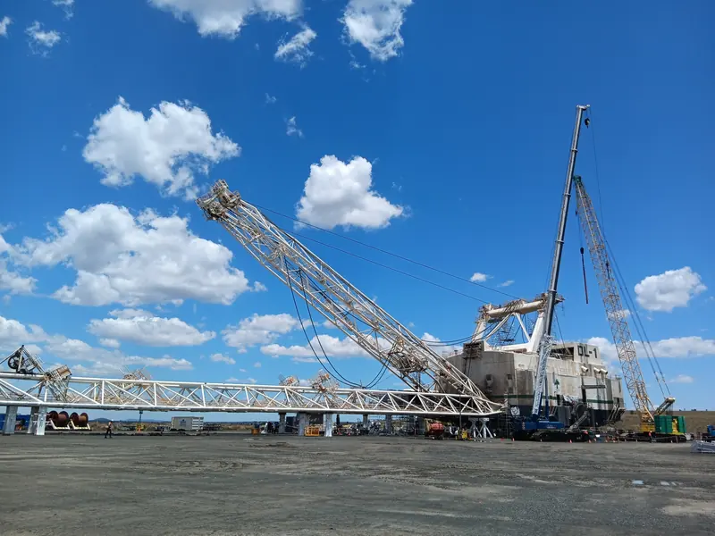 Dragline boom lowered onto stands during a major outage